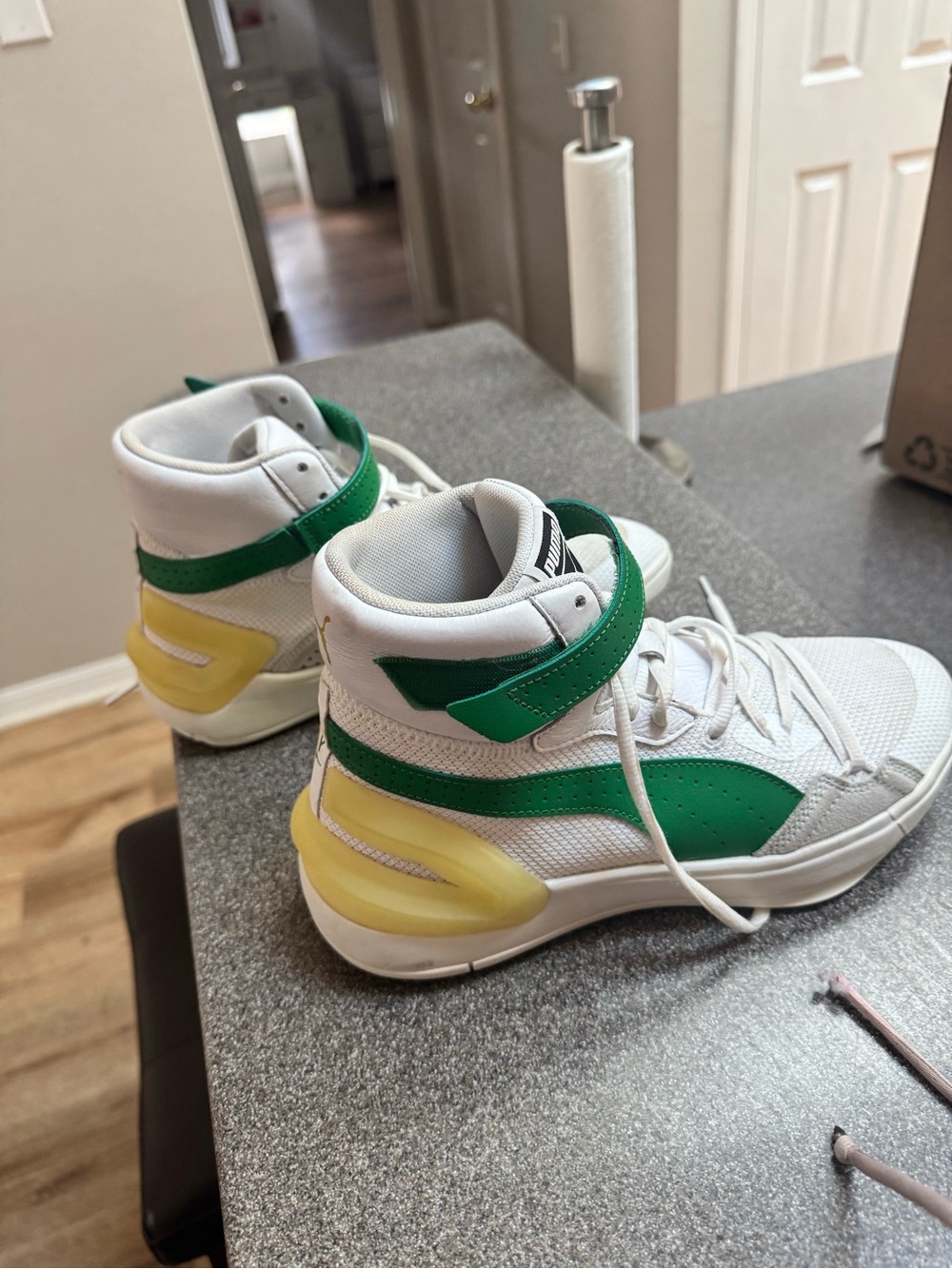 White & Green PUMA High-Top Athletic Sneakers